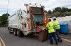 Refuse collectors loading brown bins